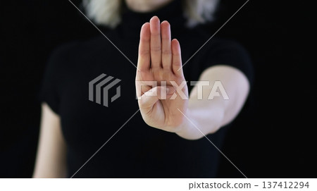 Show the help sign with hand gestures Show the help sign with hand gestures 137412294