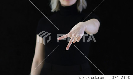 The index and middle fingers palm from the letter V, which means Victory. The index and middle fingers palm from the letter V, which means Victory. 137412308
