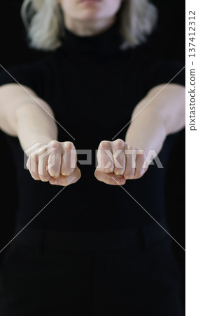 Gesture, fist hand symbol means threat punishment or bullying Gesture, fist hand symbol means threat punishment or bullying 137412312