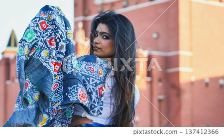Bangladeshi girl posing in front of Moscow landmark, cultural diversity and travel Bangladeshi girl posing in front of Moscow landmark, cultural diversity and travel 137412366