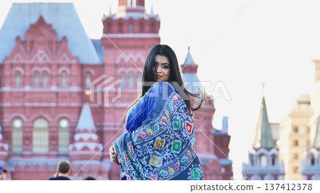 Young Bangladeshi woman traveling in Moscow, exploring historical architecture Young Bangladeshi woman traveling in Moscow, exploring historical architecture 137412378