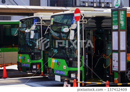 Toei buses waiting to depart from Kinshicho Station (lined up) Toei buses waiting to depart from Kinshicho Station (lined up) 137412409
