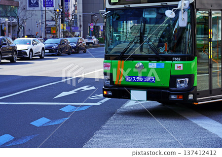 Toei bus leaving from Kinshicho Station rotary onto Keiyo Road Toei bus leaving from Kinshicho Station rotary onto Keiyo Road 137412412