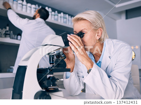 Microscope, research and woman scientist analysis or looking at sample or experiment in a laboratory for a medical project. Science, equipment and professional test bacteria or DNA in a chemistry lab 137412431