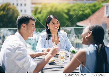 Conversation, lunch and friends eating on a rooftop of a building on break together at the office. Happy, discussion and business people talking, bonding and enjoying a meal for brunch on the balcony 137412608