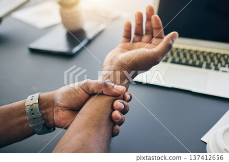 Closeup of a businessman with wrist injury, pain or accident in the office with carpal tunnel. Medical emergency, arthritis and male person with nerve, muscle or joint sprain in his arm in workplace. 137412656