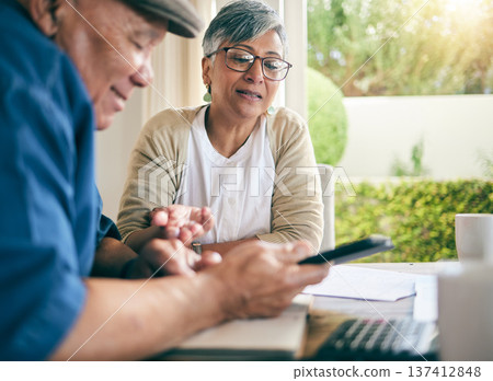 Phone, finance or old couple with budget paperwork, mortgage or banking documents at home. Bills, mature woman or senior man speaking of financial debt, investment portfolio or planning taxes cost 137412848