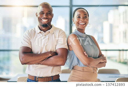 Smile, crossed arms and portrait of business people in the office with confidence and happiness. Young, pride and face of team of professional African creative designers standing in modern workplace. Smile, crossed arms and portrait of business people in the office with confidence and happiness. Young, pride and face of team of professional African creative designers standing in modern workplace. 137412893