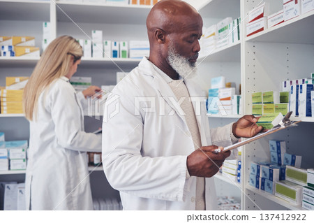Pharmacy product, clipboard and mature black man reading medicine label, prescription information or search shop shelf. Hospital inventory, box and African healthcare expert check stock checklist 137412922