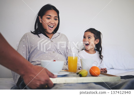 Surprise, breakfast and mother with child in bed relaxing on weekend morning at their home. Happy, smile and young mom enjoying healthy food for brunch meal with her daughter for mothers day in house Surprise, breakfast and mother with child in bed relaxing on weekend morning at their home. Happy, smile and young mom enjoying healthy food for brunch meal with her daughter for mothers day in house 137412940