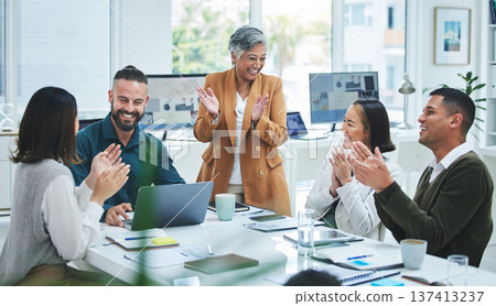 Happy business people in meeting at desk with applause, cheers and celebration of sales target achievement. Clapping, praise and congratulations with success, motivation for men and women in office. Happy business people in meeting at desk with applause, cheers and celebration of sales target achievement. Clapping, praise and congratulations with success, motivation for men and women in office. 137413237