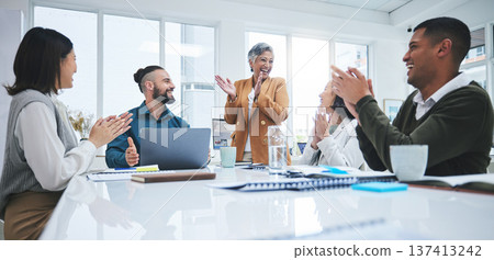 Excited team in business meeting with applause, cheers and celebration of sales target achievement at desk. Clapping, praise and congratulations with success, motivation for men and women in office. 137413242