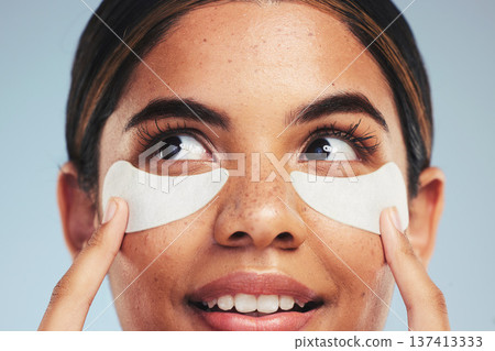 Eye patch, face and woman with beauty cosmetics, dermatology and aesthetic skincare on studio background. Closeup, model and thinking of cosmetology for eyes, facial collagen and anti aging product Eye patch, face and woman with beauty cosmetics, dermatology and aesthetic skincare on studio background. Closeup, model and thinking of cosmetology for eyes, facial collagen and anti aging product 137413333