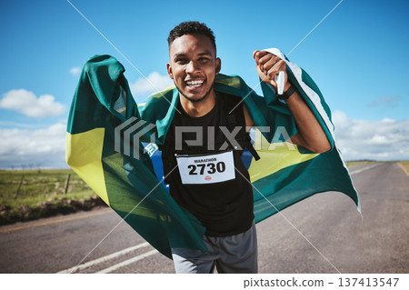Portrait, fitness and flag of Brazil with a man runner on a street in nature for motivation or success. Face, winner celebration or health with an athlete cheering during cardio or endurance training Portrait, fitness and flag of Brazil with a man runner on a street in nature for motivation or success. Face, winner celebration or health with an athlete cheering during cardio or endurance training 137413547