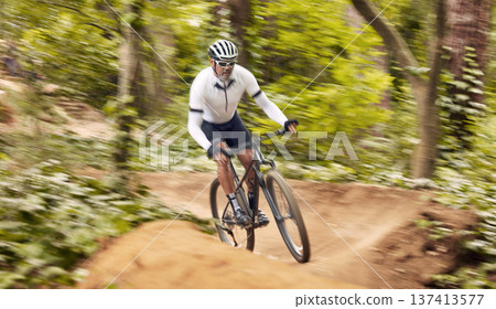 Nature cycling, bicycle and sports man travel, ride and journey on off road path, outdoor challenge or exercise. Fast mountain bike, speed blur and athlete training, fitness and workout in forest Nature cycling, bicycle and sports man travel, ride and journey on off road path, outdoor challenge or exercise. Fast mountain bike, speed blur and athlete training, fitness and workout in forest 137413577