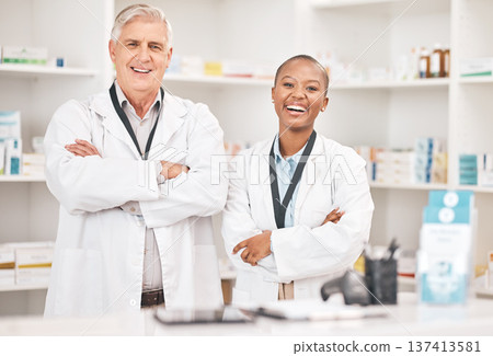 Portrait, smile and arms crossed for pharmacy with a team in a drugstore for healthcare or treatment. Medical, collaboration or teamwork with a man and woman pharmacist happy a dispensary together Portrait, smile and arms crossed for pharmacy with a team in a drugstore for healthcare or treatment. Medical, collaboration or teamwork with a man and woman pharmacist happy a dispensary together 137413581
