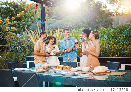 Smile, diversity and friends at lunch in a garden with drinks, conversation and talking at a party. Happy, alcohol and group of men and women at an outdoor backyard dinner with communication 137413598