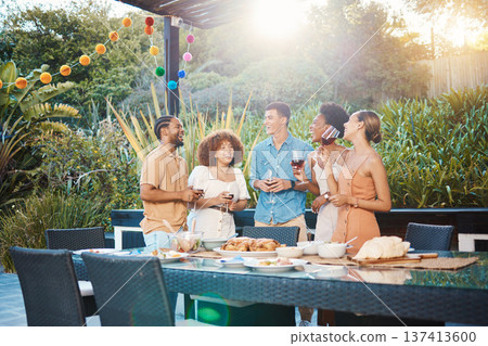 Conversation, group of friends at dinner in garden at party and celebration with diversity, food and wine at outdoor lunch. Chat, men and women at table, fun people with drinks in backyard together. Conversation, group of friends at dinner in garden at party and celebration with diversity, food and wine at outdoor lunch. Chat, men and women at table, fun people with drinks in backyard together. 137413600