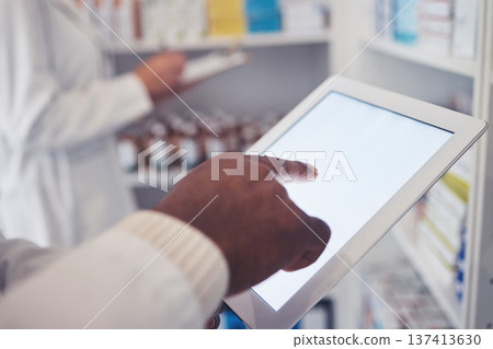Typing, pharmacy and hands with a tablet for a search, check of stock or medicine update online. Closeup, connection and medical employee on technology for healthcare inventory or website at a clinic Typing, pharmacy and hands with a tablet for a search, check of stock or medicine update online. Closeup, connection and medical employee on technology for healthcare inventory or website at a clinic 137413630