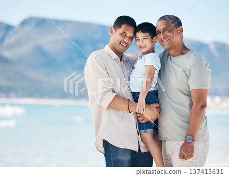 Happy, portrait and a family at the beach for a vacation, walking by the sea or travel together. Care, smile and a father, grandfather and a child at the ocean in the morning for a holiday in summer Happy, portrait and a family at the beach for a vacation, walking by the sea or travel together. Care, smile and a father, grandfather and a child at the ocean in the morning for a holiday in summer 137413631