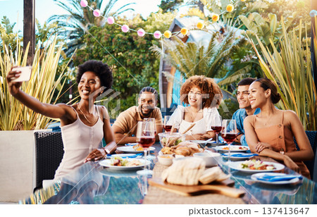 Friends in selfie at lunch, party in garden and happy event with diversity, food and wine, outdoor bonding together. Photography, men and women at dinner table, people eating with drinks in backyard. 137413647