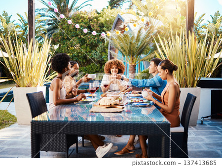 Group of friends at lunch, fun in garden and happy event with diversity, food and wine, outdoor bonding together. Dinner party, men and women at table, people eating with drinks in backyard in summer Group of friends at lunch, fun in garden and happy event with diversity, food and wine, outdoor bonding together. Dinner party, men and women at table, people eating with drinks in backyard in summer 137413685