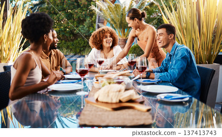 Friends, people and food outdoor on a table for social gathering, happiness and holiday celebration. Diversity, men and women group eating lunch at a party or reunion with drinks to relax in a garden 137413743