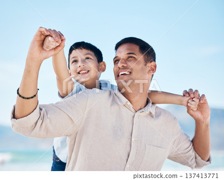 Happy, beach and father doing airplane with child having fun on family vacation or holiday. Happiness, smile and young dad playing with his boy kid by the ocean on adventure or weekend trip together. Happy, beach and father doing airplane with child having fun on family vacation or holiday. Happiness, smile and young dad playing with his boy kid by the ocean on adventure or weekend trip together. 137413771