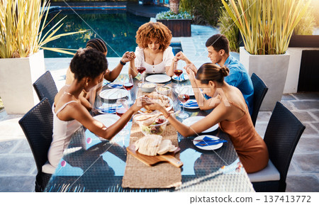 Holding hands, food and people pray outdoor at table for gratitude and holiday celebration. Group of friends together at lunch, party or reunion with drinks in garden for thanks, prayer and grace Holding hands, food and people pray outdoor at table for gratitude and holiday celebration. Group of friends together at lunch, party or reunion with drinks in garden for thanks, prayer and grace 137413772