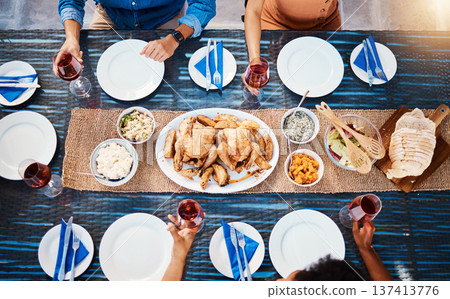 Wine, food or top of friends in restaurant to relax on holiday vacation at a party event together. Food, group celebration or hands of people eating chicken at table for lunch, dinner or brunch meal Wine, food or top of friends in restaurant to relax on holiday vacation at a party event together. Food, group celebration or hands of people eating chicken at table for lunch, dinner or brunch meal 137413776