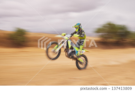 Speed, nature and a person on a motorbike for a race, travel or freedom in sports. Cycling, power and a man or professional driver with energy on a bike while driving for a challenge on a course Speed, nature and a person on a motorbike for a race, travel or freedom in sports. Cycling, power and a man or professional driver with energy on a bike while driving for a challenge on a course 137413809