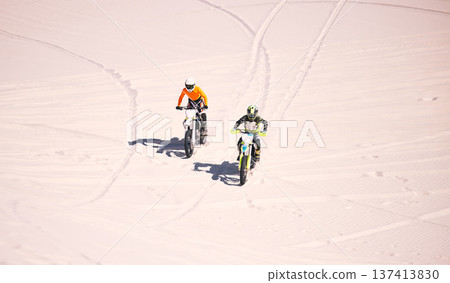 Dune, off road and men on motorbike together for practice, training and extreme sports energy in nature. Professional dirt biking challenge, friends and danger with motorcycle competition in desert. Dune, off road and men on motorbike together for practice, training and extreme sports energy in nature. Professional dirt biking challenge, friends and danger with motorcycle competition in desert. 137413830