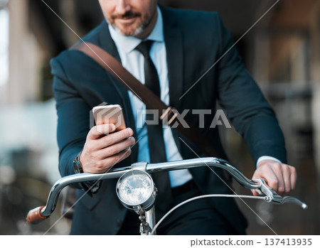 Businessman, phone in hands and bicycle outdoor for communication, travel and transportation. Entrepreneur person with a bike and smartphone for internet connection, carbon footprint and journey Businessman, phone in hands and bicycle outdoor for communication, travel and transportation. Entrepreneur person with a bike and smartphone for internet connection, carbon footprint and journey 137413935