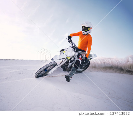 Bike, sand and speed with a man on mockup riding a vehicle in the desert for adventure or adrenaline. Motorcycle, training and freedom with an athlete on space in nature for power or extreme sports Bike, sand and speed with a man on mockup riding a vehicle in the desert for adventure or adrenaline. Motorcycle, training and freedom with an athlete on space in nature for power or extreme sports 137413952