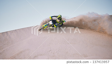 Bike, sand and space with a sports man riding a vehicle in the desert for adventure or adrenaline. Motorcycle, training and dust with an athlete on mockup in nature for power or active competition Bike, sand and space with a sports man riding a vehicle in the desert for adventure or adrenaline. Motorcycle, training and dust with an athlete on mockup in nature for power or active competition 137413957