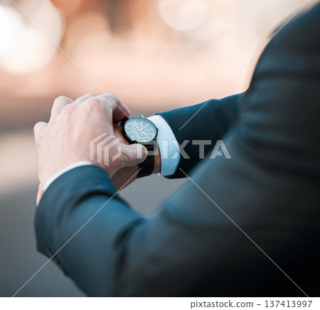 Businessman, watch and check time on clock for travel in city with a schedule, delay or entrepreneur planning morning appointment. Hands, checking and business hours of manager, employee or executive Businessman, watch and check time on clock for travel in city with a schedule, delay or entrepreneur planning morning appointment. Hands, checking and business hours of manager, employee or executive 137413997