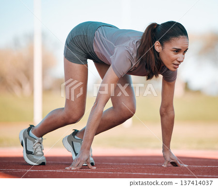 Woman, fitness and running start in athletics, motivation or competition on stadium or track. Active female person or runner ready in sprint marathon, cardio workout or outdoor performance Woman, fitness and running start in athletics, motivation or competition on stadium or track. Active female person or runner ready in sprint marathon, cardio workout or outdoor performance 137414037