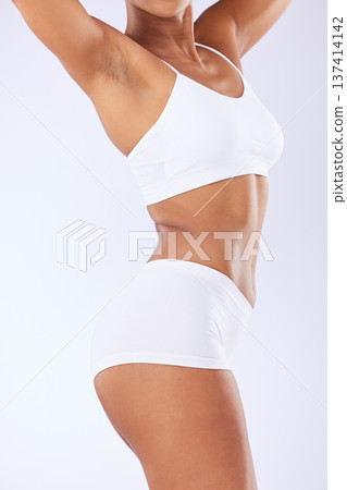Workout, underwear and body of studio person with results of training, liposuction or fitness transformation. Diet, weight loss and model with wellness, self care and exercise on white background 137414142