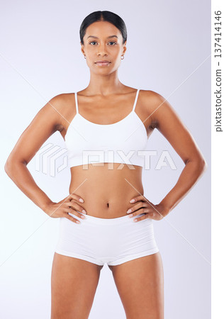 Portrait, health and woman in a bikini, wellness and training on a white studio background. Person, girl and model with exercise with fitness, weight loss and self care with confidence and aesthetic Portrait, health and woman in a bikini, wellness and training on a white studio background. Person, girl and model with exercise with fitness, weight loss and self care with confidence and aesthetic 137414146