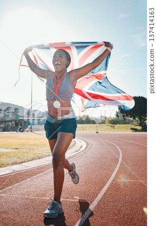 Runner, achievement and black woman with celebration, UK flag and sports with competition, pride and winner. African person, happy athlete or champion with British symbol, pride and medal for winning Runner, achievement and black woman with celebration, UK flag and sports with competition, pride and winner. African person, happy athlete or champion with British symbol, pride and medal for winning 137414163