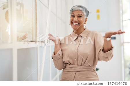 Excited, portrait and a mature woman at work say hello with confidence in professional career. Happy, business and manager or company ceo with a gesture for office management or working at an agency Excited, portrait and a mature woman at work say hello with confidence in professional career. Happy, business and manager or company ceo with a gesture for office management or working at an agency 137414478