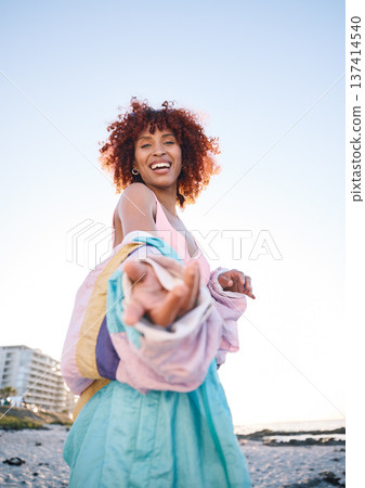 Portrait smile, woman and helping hand, offer or invitation at beach in low angle mockup space. Happy, palm and African person giving assistance in support, care or acceptance of handshake to welcome 137414540