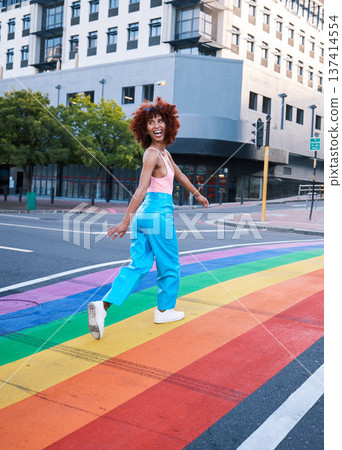 Happy, walking and a woman on a pride street for a celebration of freedom of love. Smile, city and a girl or person in support of lgbt community on a rainbow road for equality, excited and identity Happy, walking and a woman on a pride street for a celebration of freedom of love. Smile, city and a girl or person in support of lgbt community on a rainbow road for equality, excited and identity 137414554