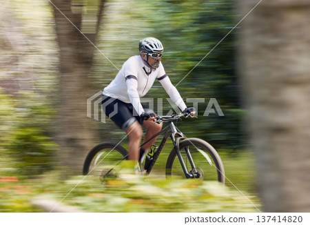 Freedom, fitness and man cycling in forest with energy, training or nature, workout and off road race. Speed, workout and cyclist on mountain bike for extreme sports, adrenaline or power performance Freedom, fitness and man cycling in forest with energy, training or nature, workout and off road race. Speed, workout and cyclist on mountain bike for extreme sports, adrenaline or power performance 137414820