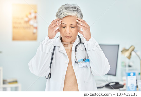 Headache, stress of woman and mature doctor in hospital, burnout and fatigue. Medical professional, sick and person with migraine, pain or frustrated in healthcare crisis, mistake or challenge fail Headache, stress of woman and mature doctor in hospital, burnout and fatigue. Medical professional, sick and person with migraine, pain or frustrated in healthcare crisis, mistake or challenge fail 137415133