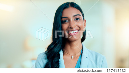 Satisfied, confident entrepreneur doing an online training for a remote, distance job. Closeup face portrait of a successful business woman standing and smiling against a bokeh, copyspace background. Satisfied, confident entrepreneur doing an online training for a remote, distance job. Closeup face portrait of a successful business woman standing and smiling against a bokeh, copyspace background. 137415282