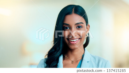Satisfied, confident entrepreneur doing an online training for a remote, distance job. Closeup face portrait of a successful business woman standing and smiling against a bokeh, copyspace background. Satisfied, confident entrepreneur doing an online training for a remote, distance job. Closeup face portrait of a successful business woman standing and smiling against a bokeh, copyspace background. 137415285