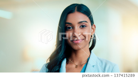 Satisfied, confident entrepreneur doing an online training for a remote, distance job. Closeup face portrait of a successful business woman standing and smiling against a bokeh, copyspace background. Satisfied, confident entrepreneur doing an online training for a remote, distance job. Closeup face portrait of a successful business woman standing and smiling against a bokeh, copyspace background. 137415289
