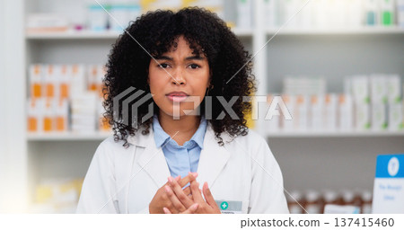 Friendly female chemist explaining the benefits of medicine. African American woman pharmacist listening to the symptoms of the customer. Health worker recommending a specific product to the client Friendly female chemist explaining the benefits of medicine. African American woman pharmacist listening to the symptoms of the customer. Health worker recommending a specific product to the client 137415460