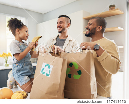 Shopping, bags and happy family with groceries in home and girl with fruit and gay parents, dad and father in kitchen. Sustainable, paper bag and people with eco friendly grocery, product or fruits 137415650